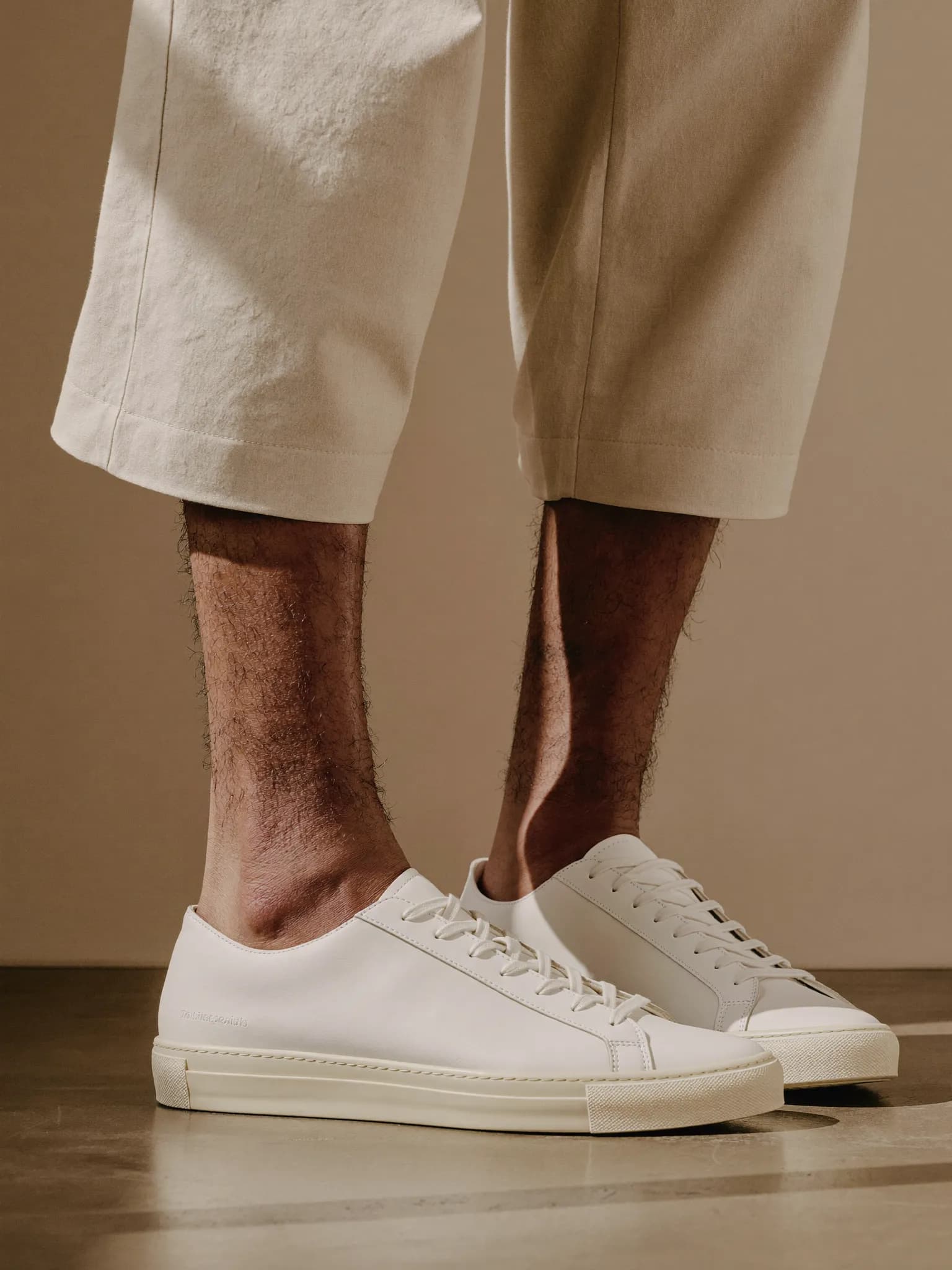 Model wearing the Off-White Court Low Sneaker.