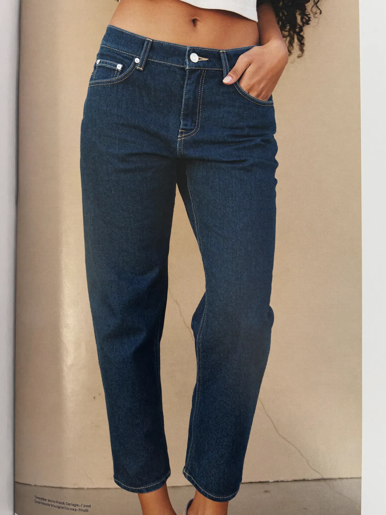 Model wearing the Indigo High-Rise Straight Jeans.