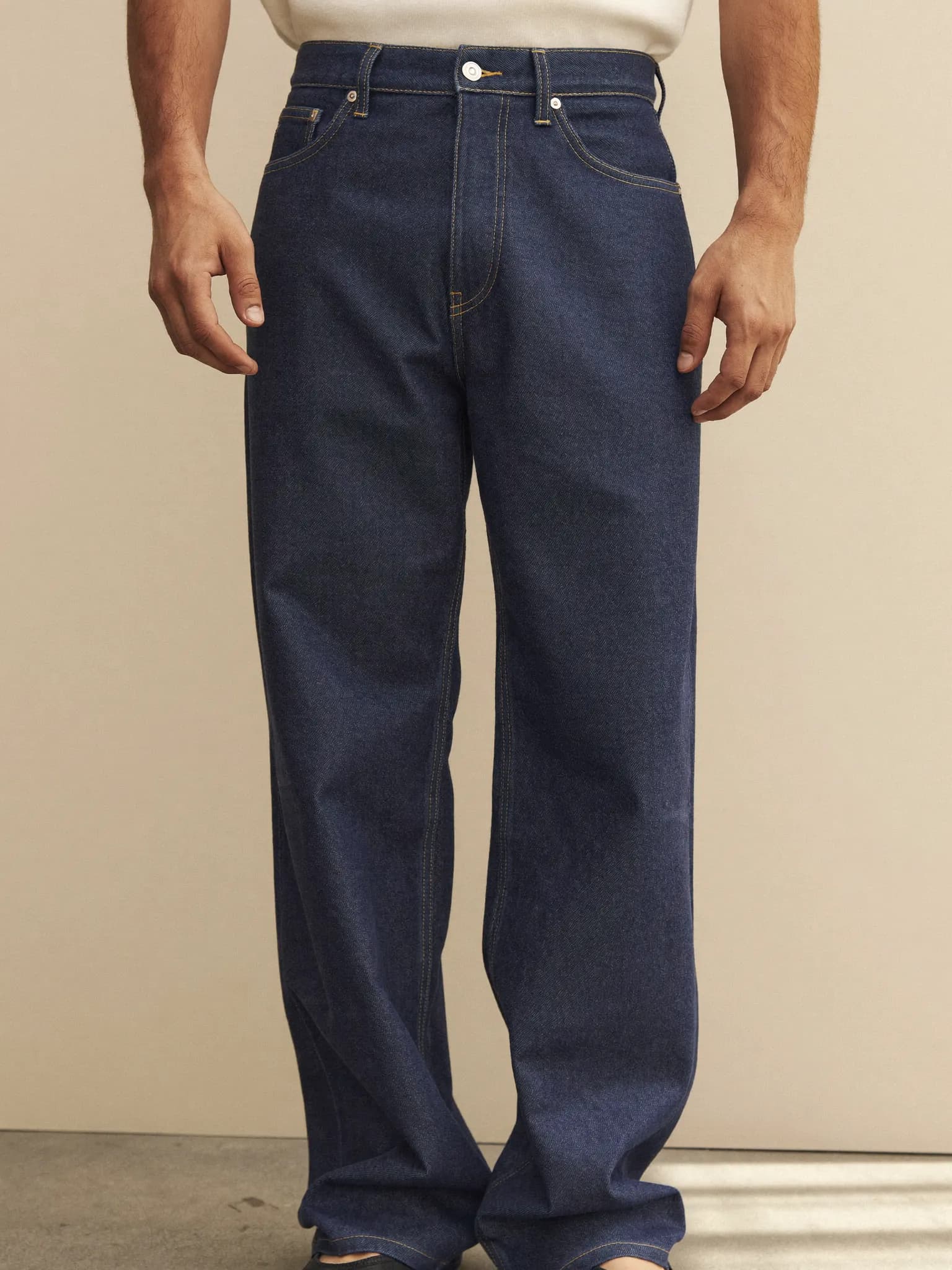 Model wearing the Indigo Straight-Leg Selvedge Jeans.