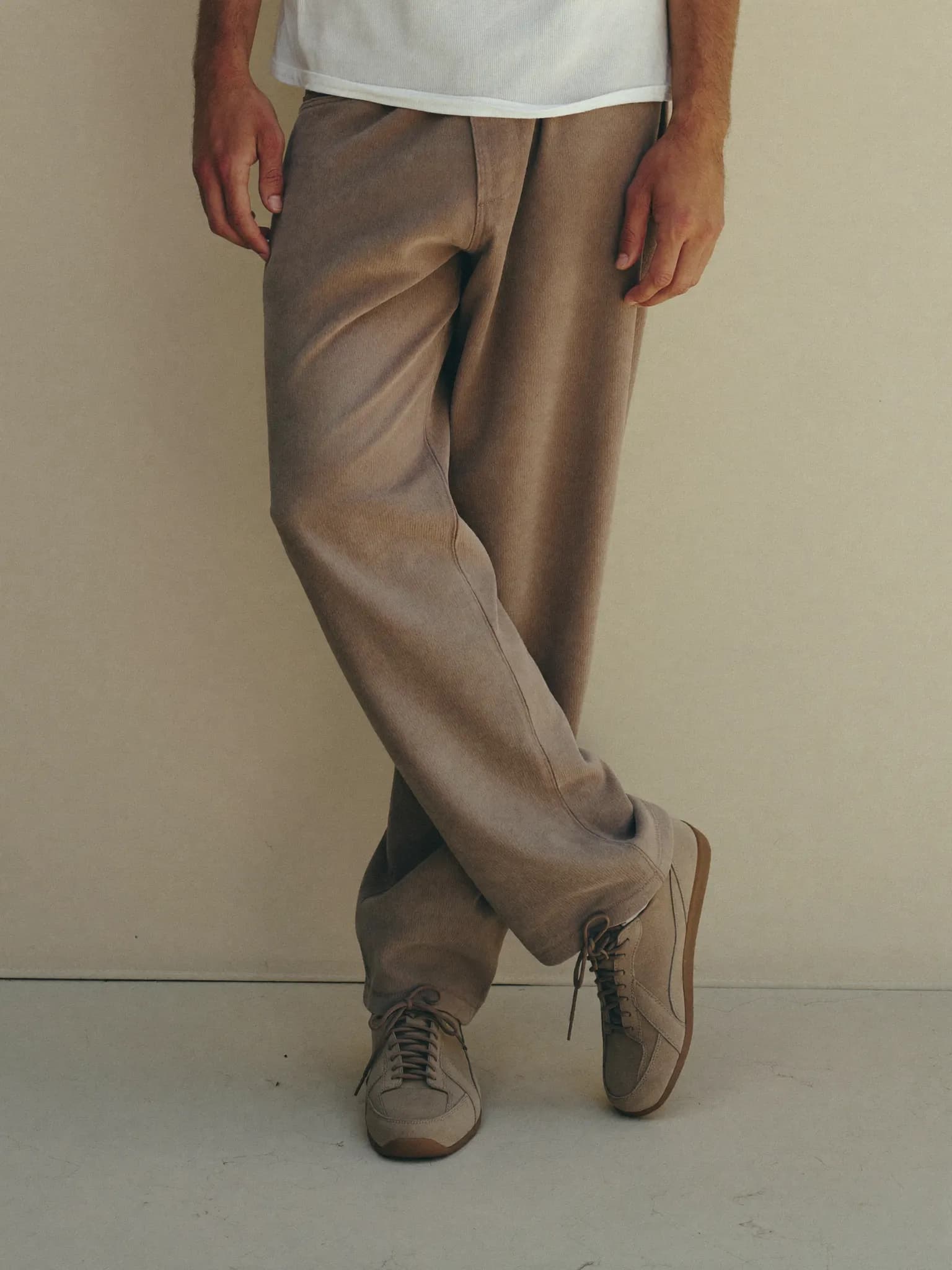 Model wearing the Taupe Suede Runner.